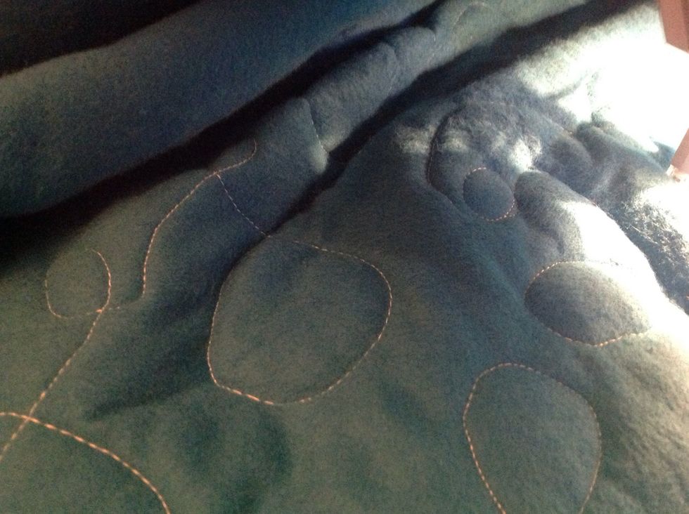 Use free motion quilting or draw lines or design using chalk to mark.