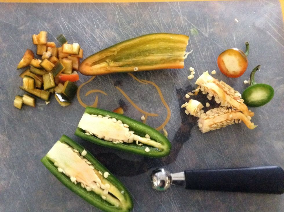 Use gloves if you wish, jalape\u00f1os can be hot & cause a sting on your hands. Seed your peppers & remove as much of the ribs. That is where the heat is. Then dice into small pieces with paring knife.