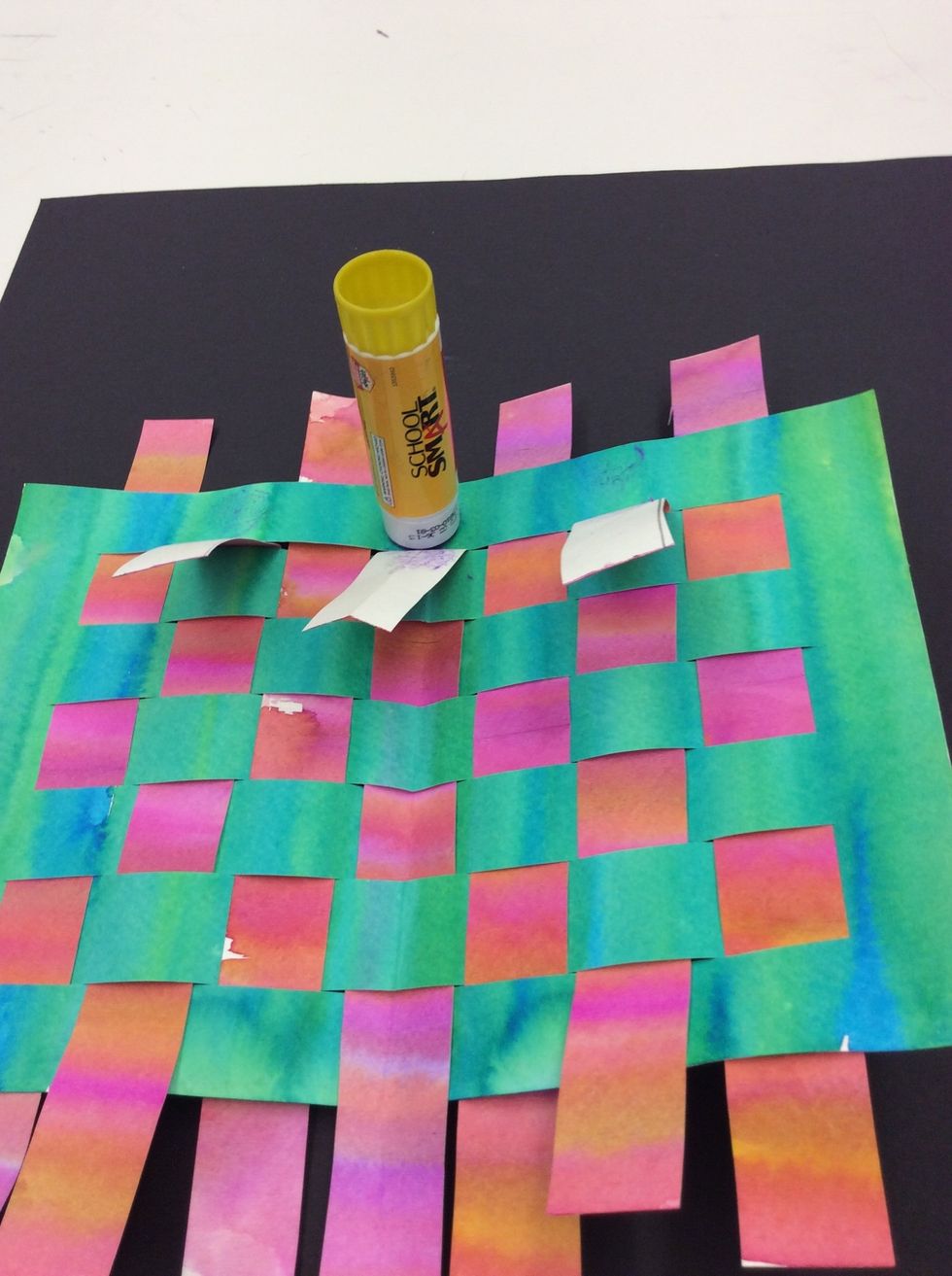 Use glue stick to glue all ends down.