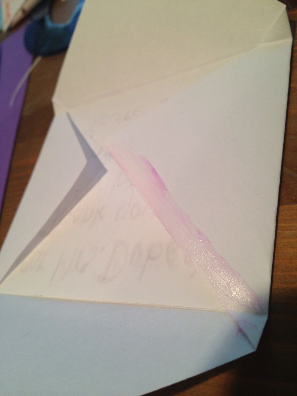 Use glue to secure the envelope flaps.