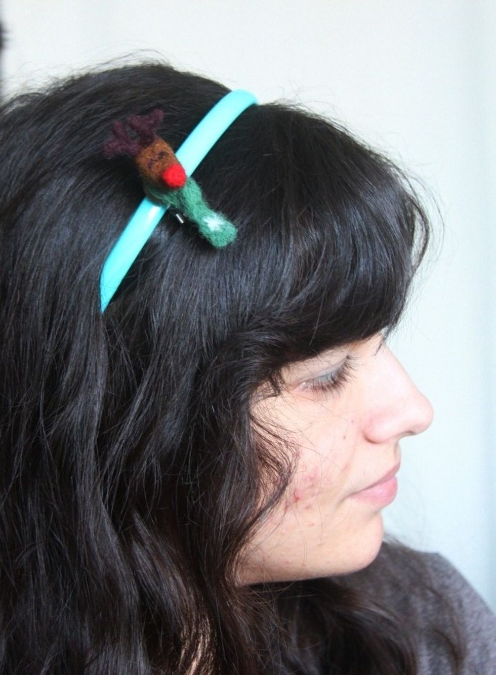 Use glue to stick Rudolf to the brooch pin and voila!