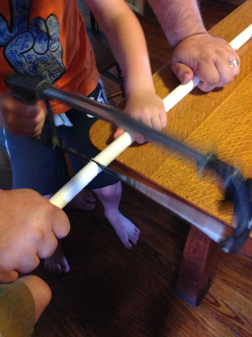 Use hack saw to cut through PVC pipe