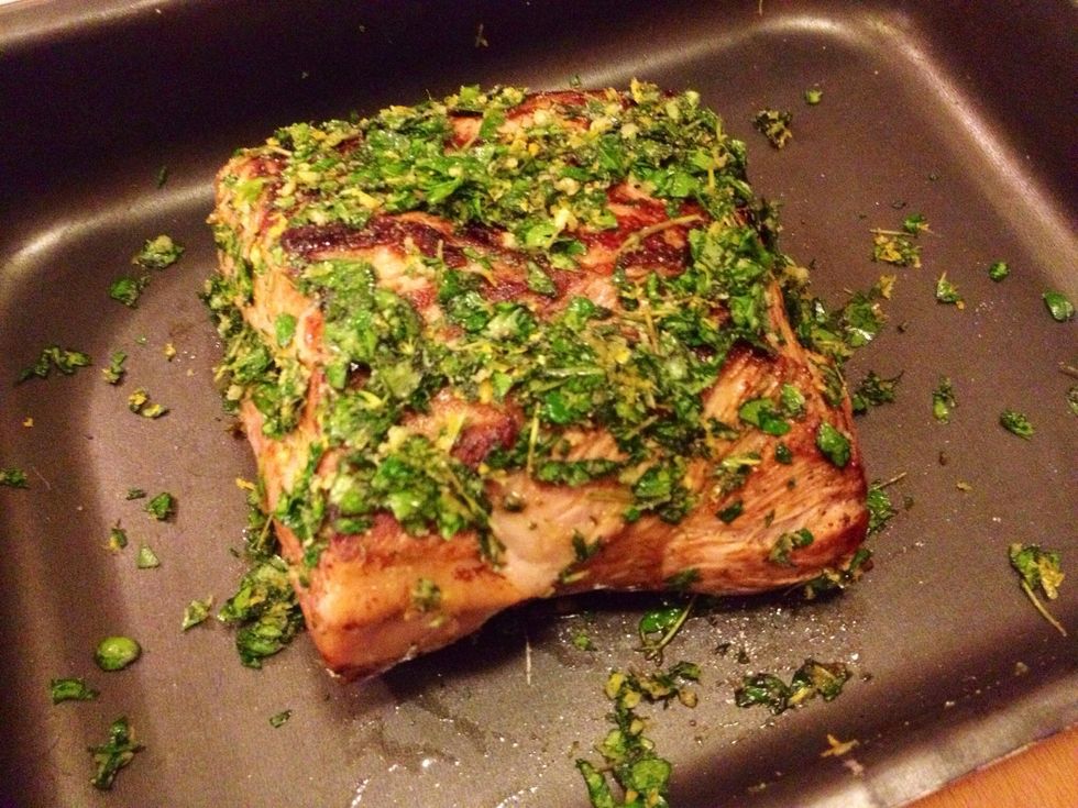 Use half (or a little more) of the herb mix to cover the meat. Rub it into the meat on all sides.
