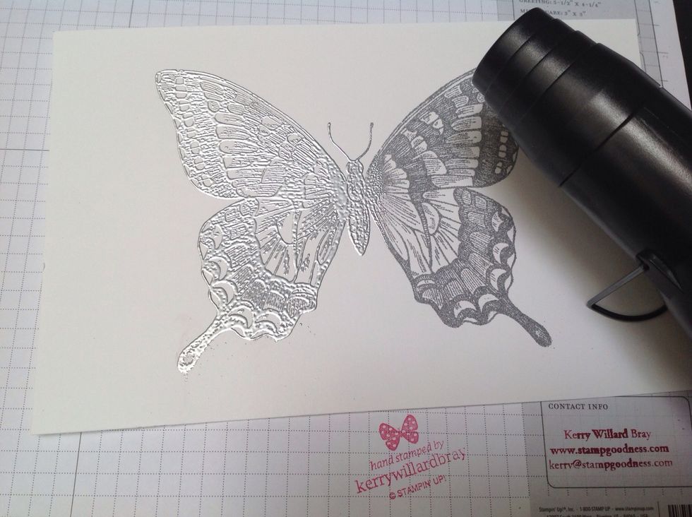 Use heat tool to set you embossing powder - here the left side of butterfly has been heated and the right has not
