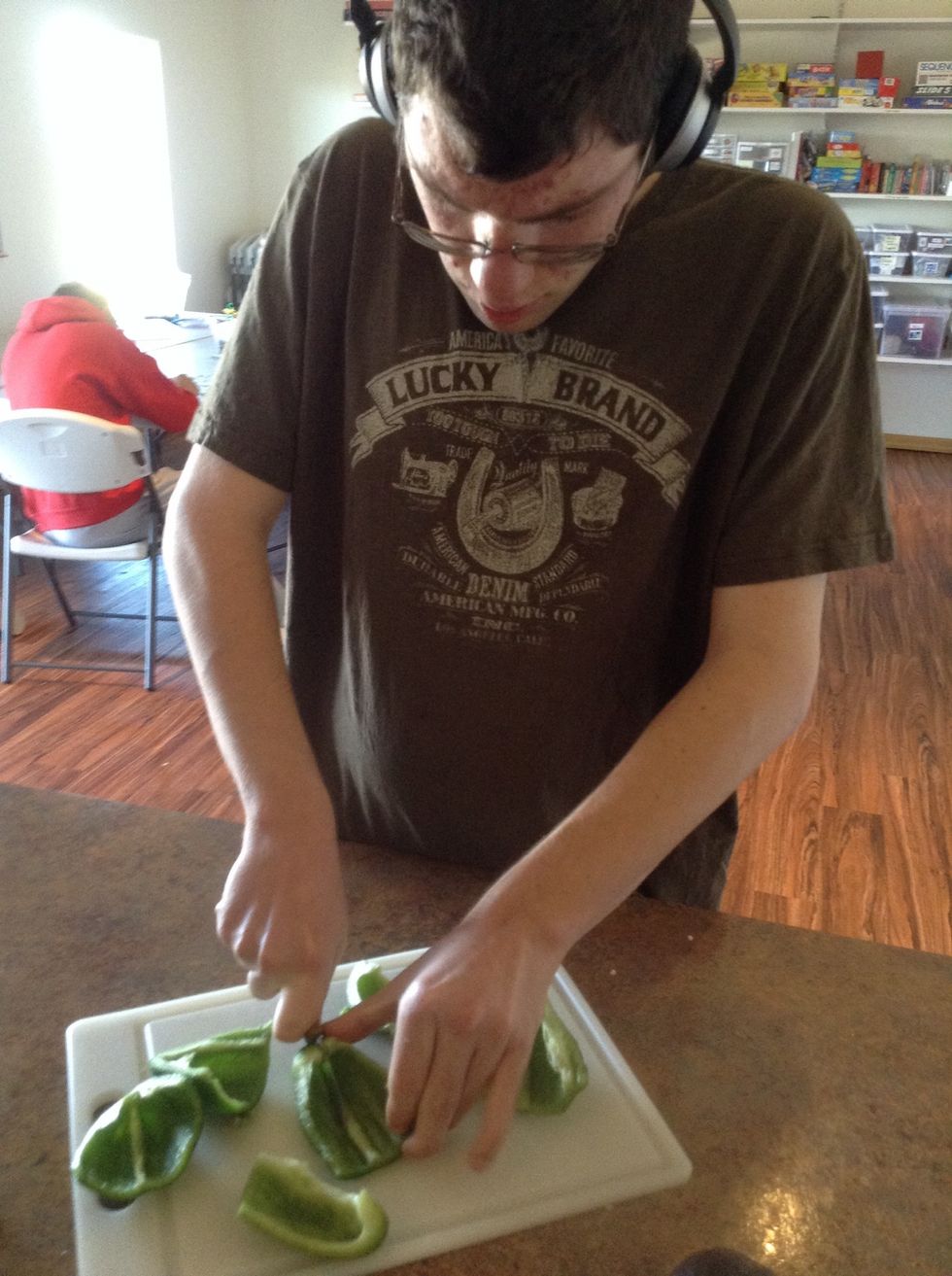 Use knife to cut the peppers into 4 seperate pieces