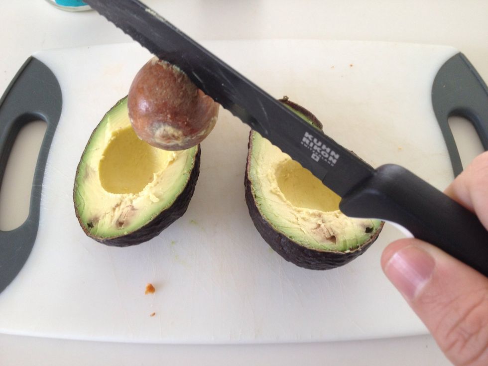 Use knife to remove pit. Discard pit.