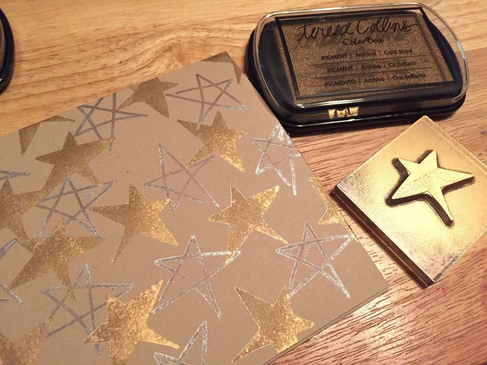 use large solid star and Gold Shine Ink to add stars all over card front.