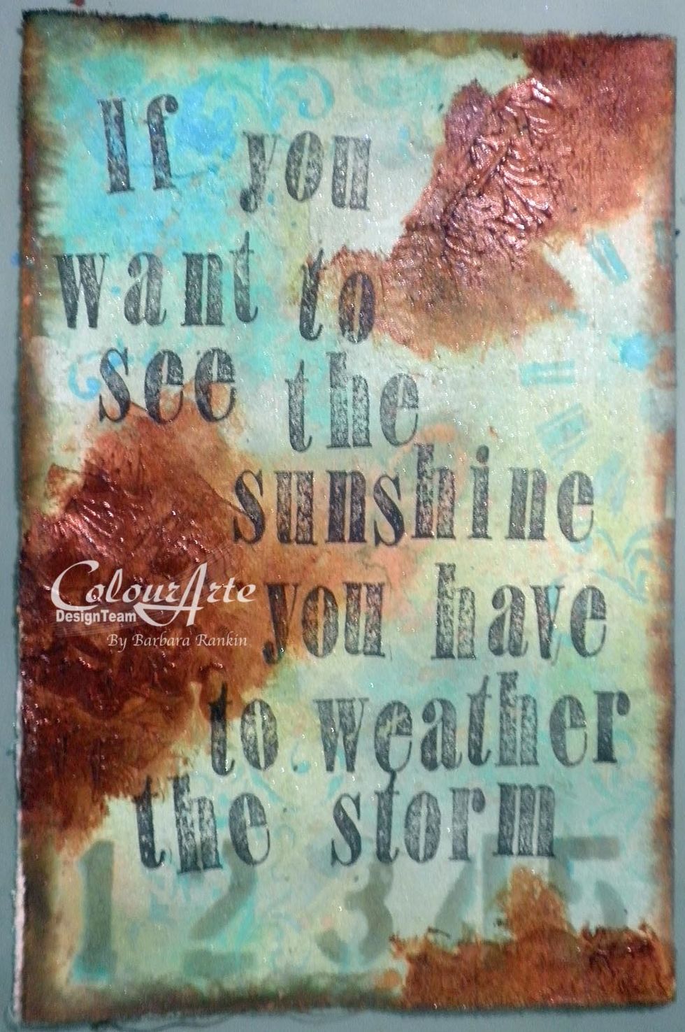 Use makeup sponge to apply Mediterranean Radiant Rain through various sections of the Bee on Time stencil. I sponged through the clock face and the flourishes randomly over the page for depth.