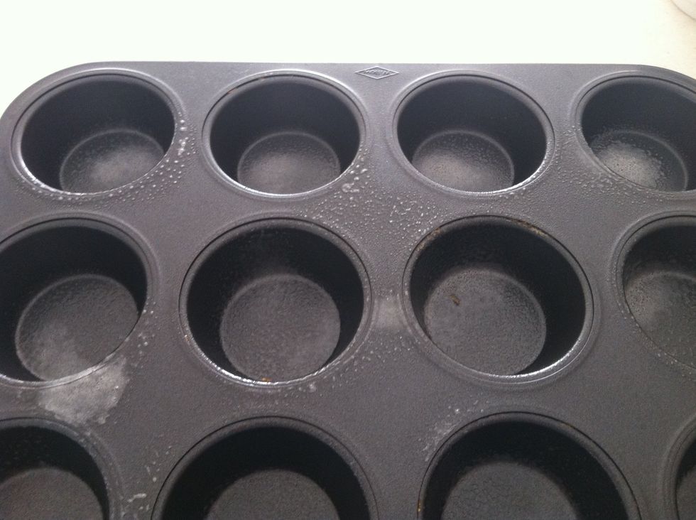 Use non stick muffin tray or spray oil, this allows for easy removal and also crisps the bread base
