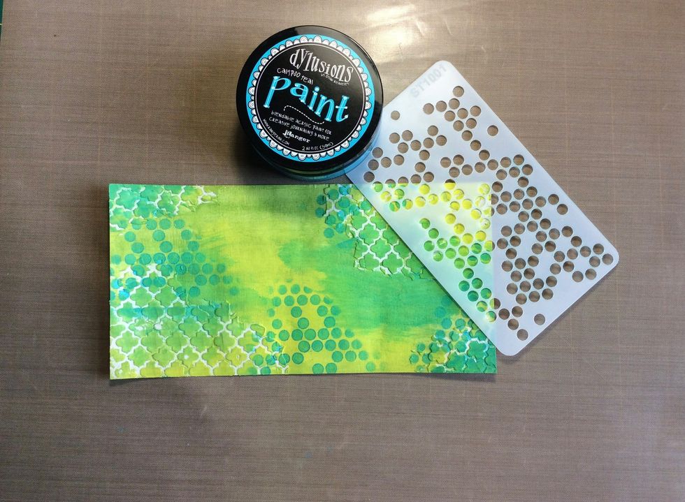 Use one of the three colours and a different stencil to add to your background. I used scrapmatts stencil ST1001.