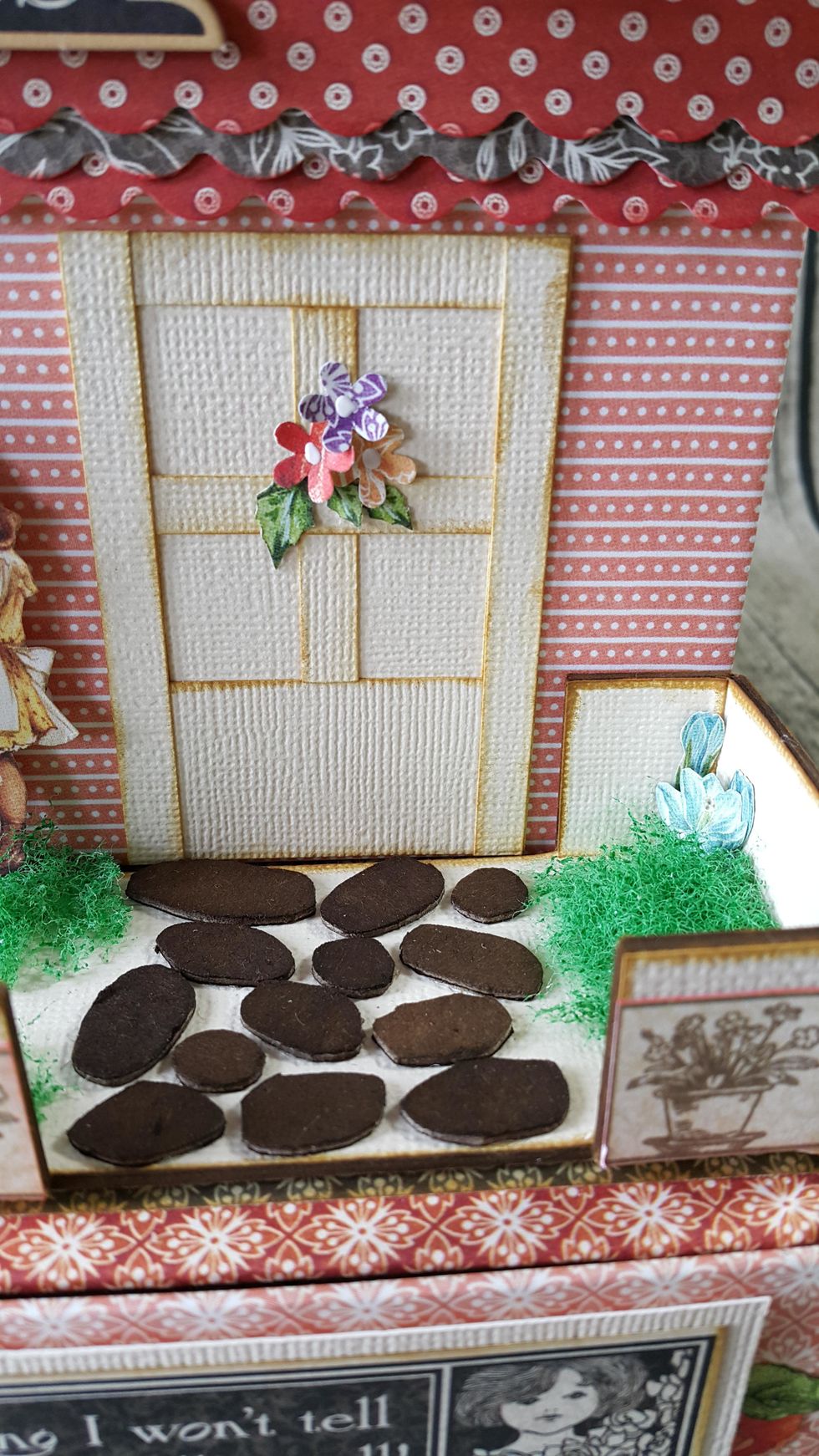 Use paper flowers or fussy cut flowers to decorate your garden.