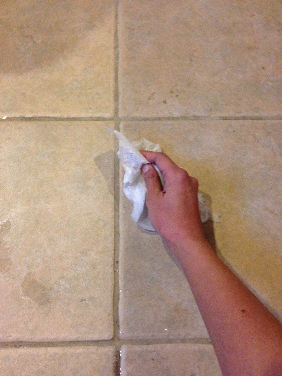 Use paper towels to clean the excess peroxide after scrubbing
