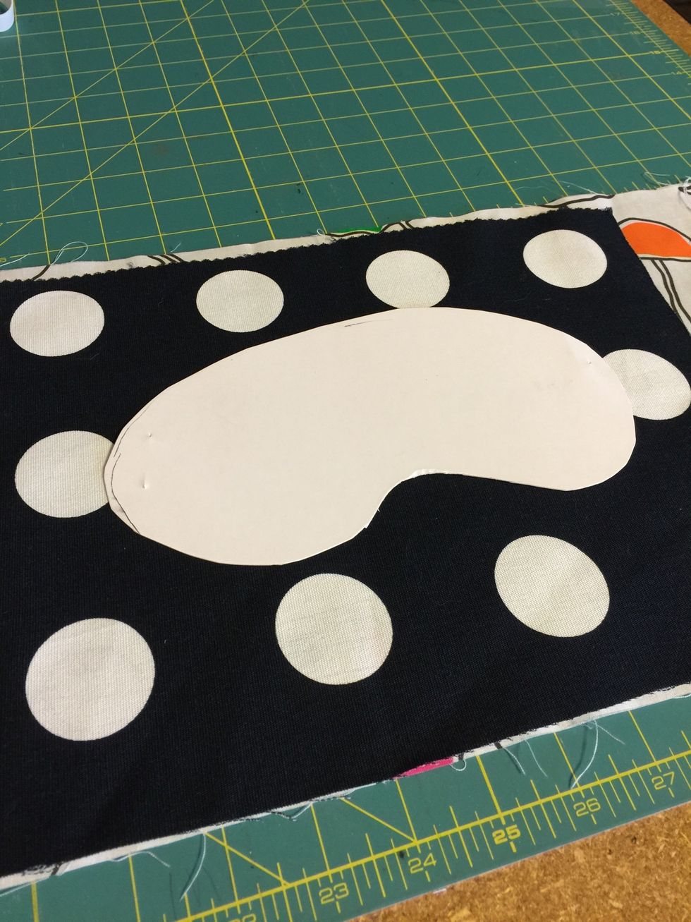 Use pattern to cut out two pieces of fabric for your eye mask.
