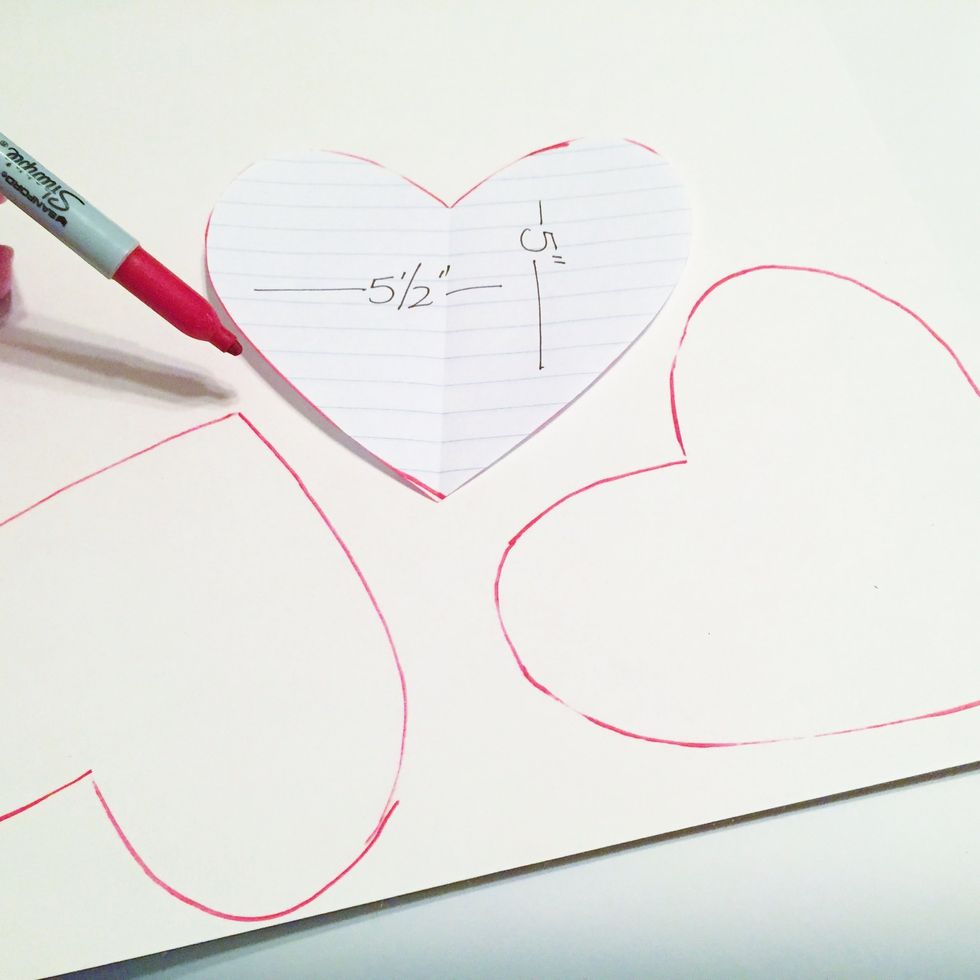 use pattern to trace 3 hearts onto white chipboard. trace 4 hearts if you aren't using a denim pocket in your banner.