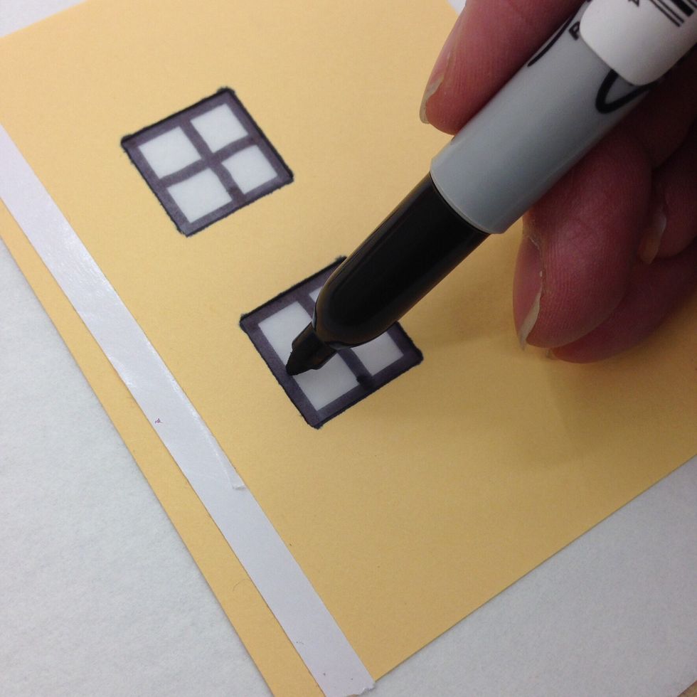 Use permanent marker's to decorate the windows as desired.