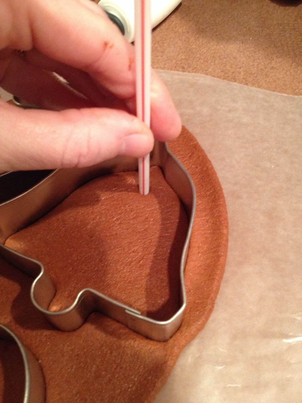 Use plastic straw to make a hole near the top of the ornament.