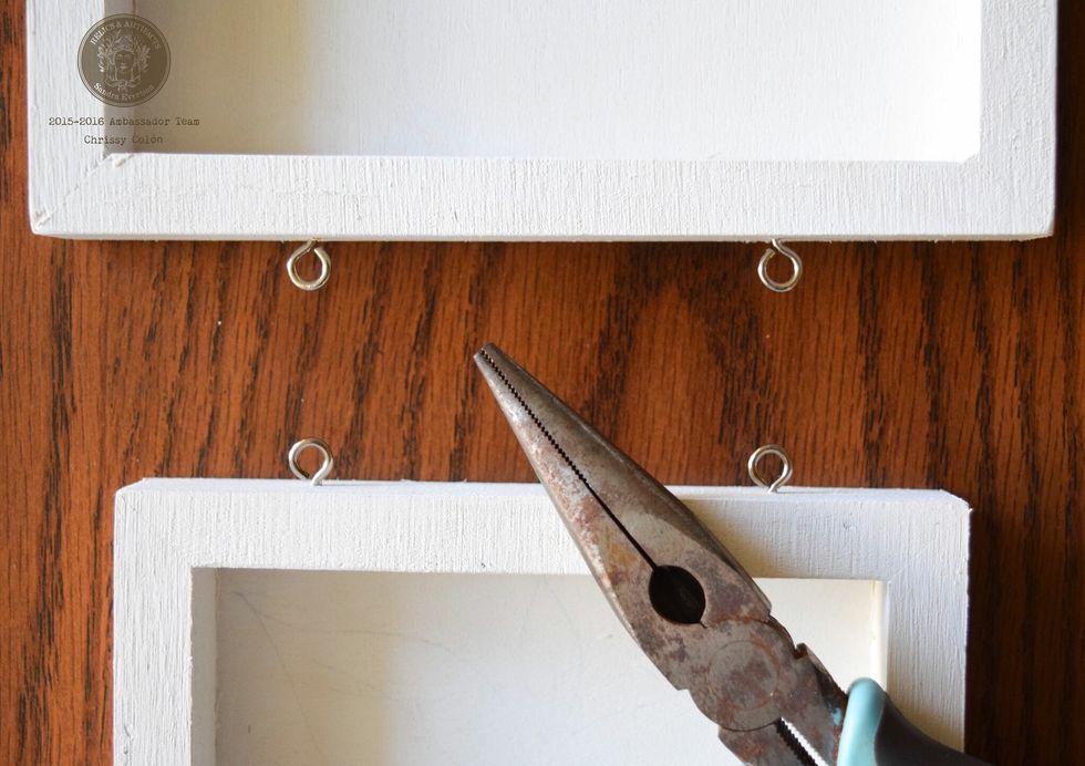 Use pliers and screw in eyelet screws