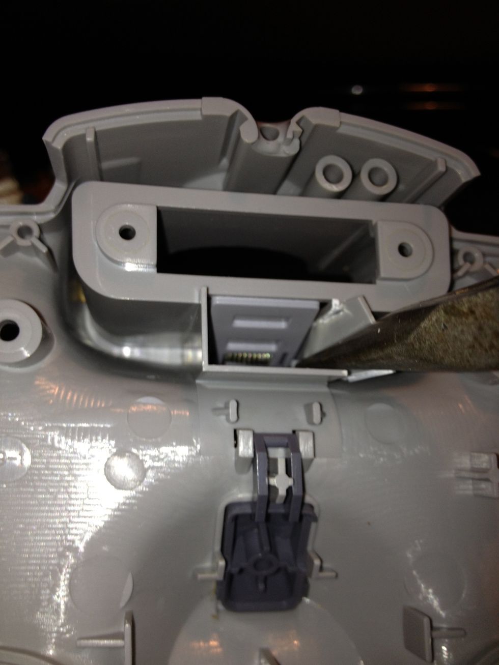 Use pliers to remove these bits of plastic as to allow the USB to not become damaged when closing the controller.