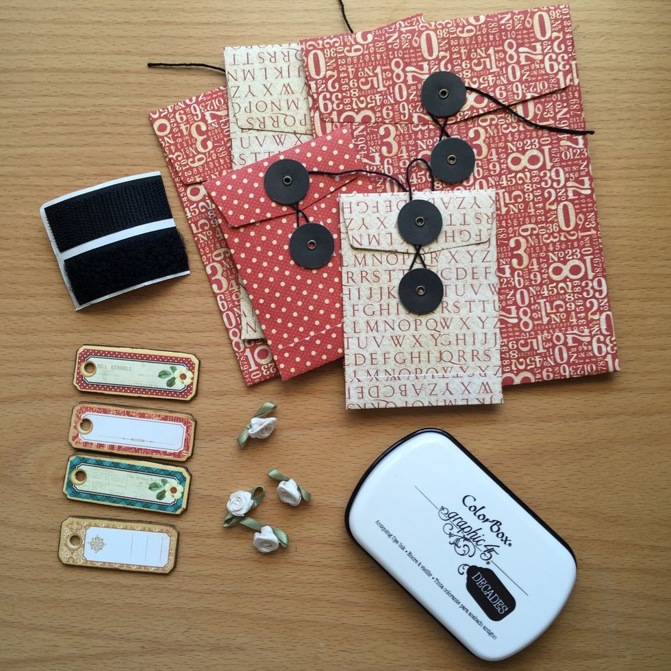 Use policy envelopes, chipboards and some flowers to complete the inside box decoration.