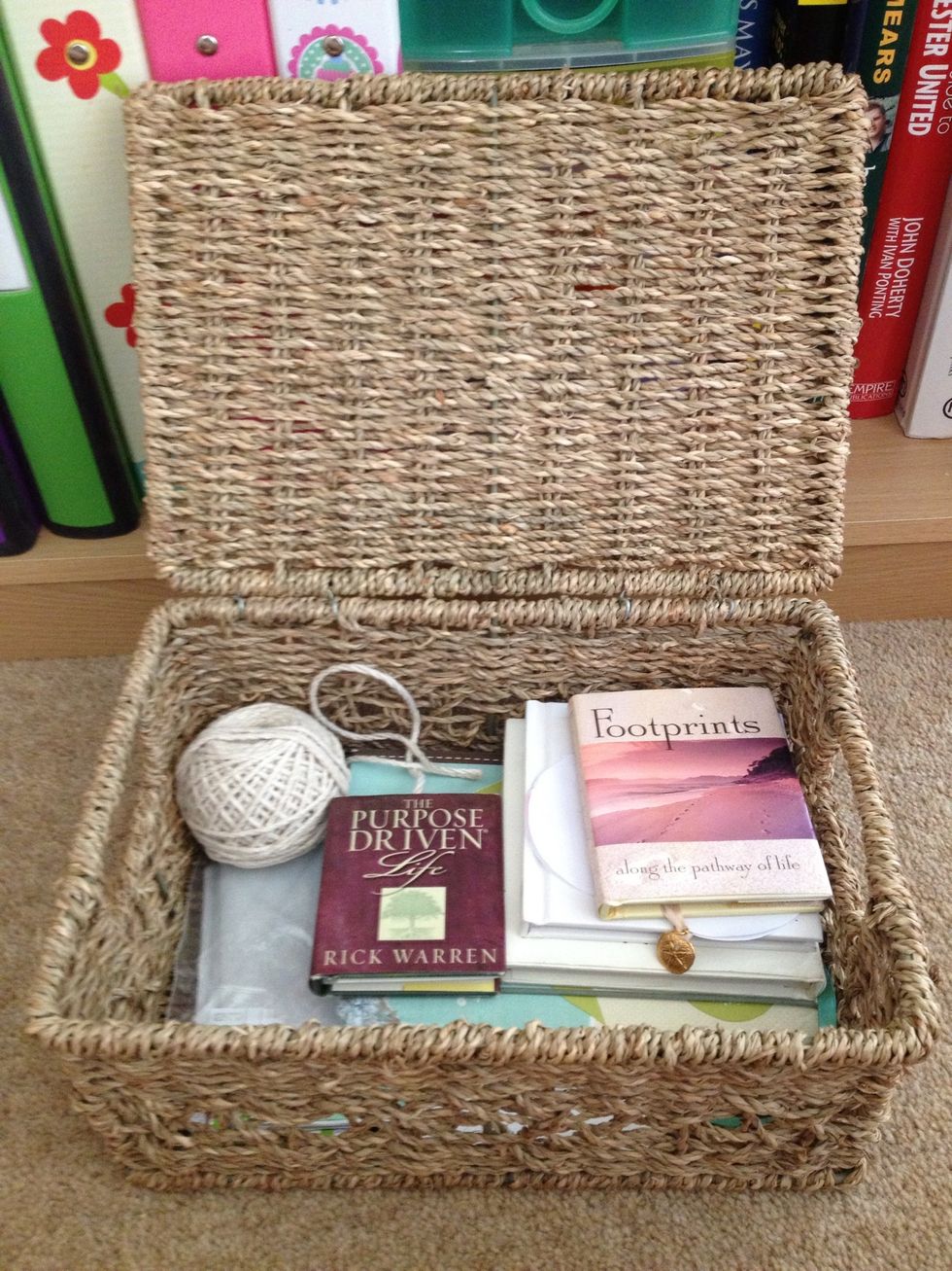 Use pretty boxes or baskets to hide all the 'junk' you need.