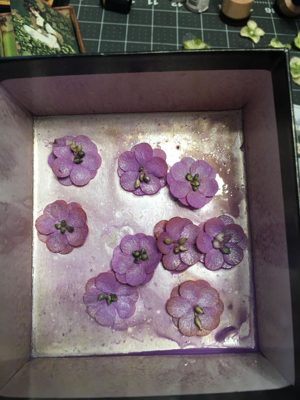 Use Prima Color Bloom Lilac spray to color the Petaloo Penny Lane Forget-me-not flowers. Allow to dry.