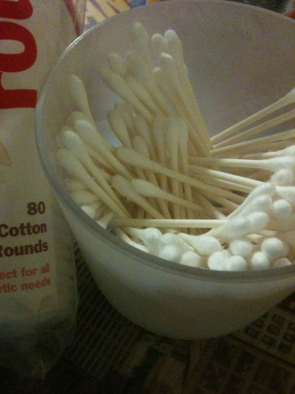Use q-Tips and rounds to remove any excess polish