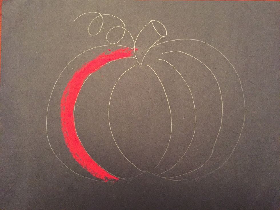 Use red to color on the first line inside your pumpkin.
