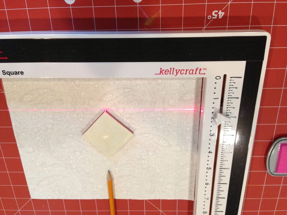 Use ruler or laser guide to align stamps
