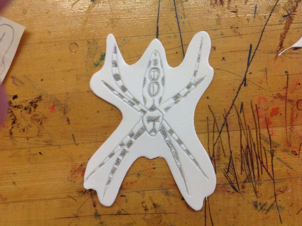 Use scissors to cut along the outer line.