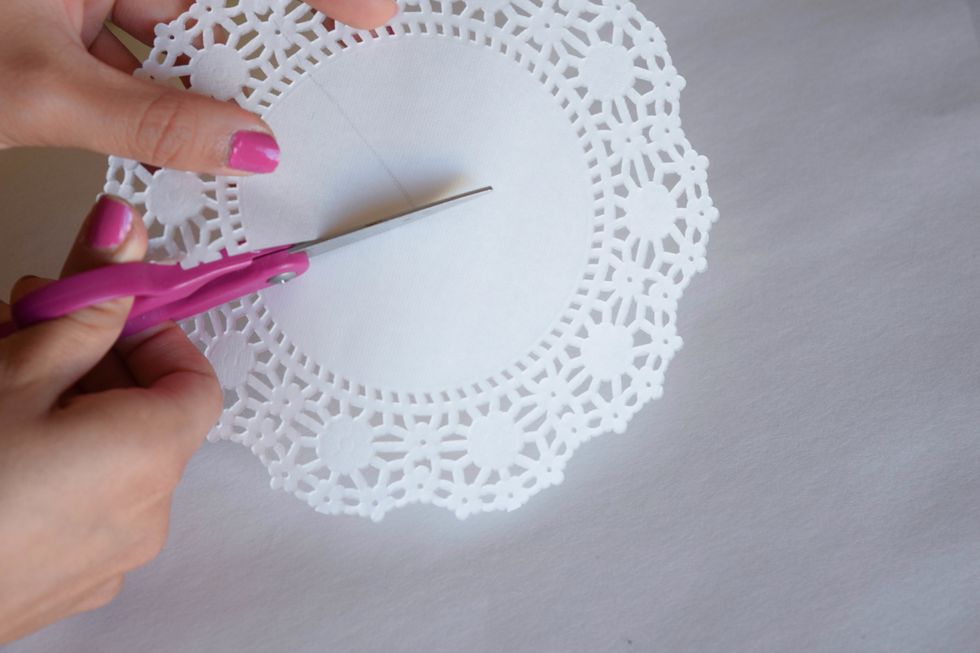 Use scissors to cut along the pencil lines you drew.