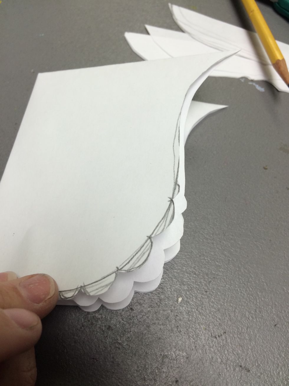 Use scissors to cut on that line.