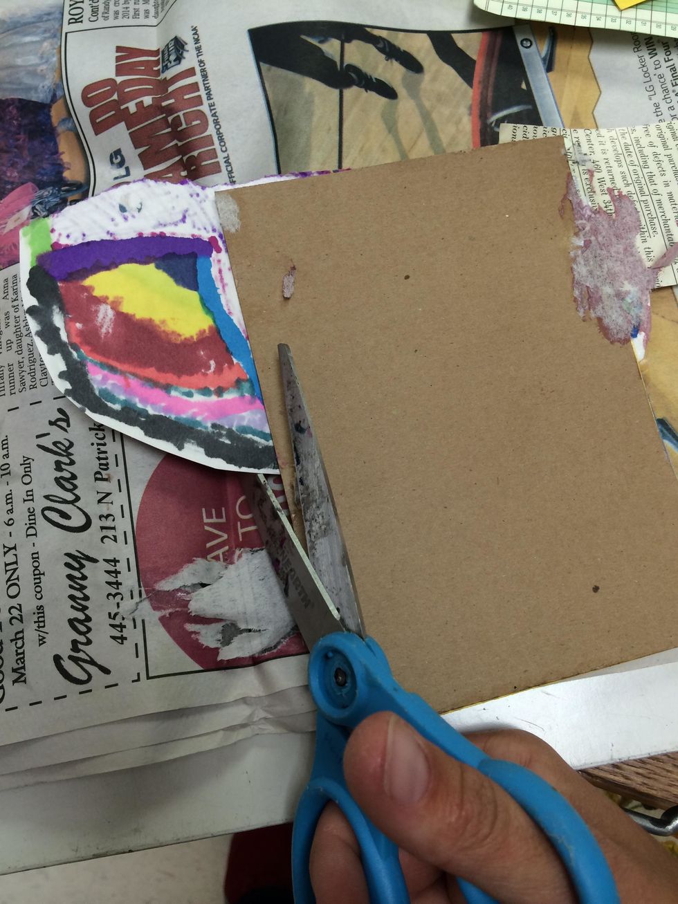 Use scissors to trim excess paper.