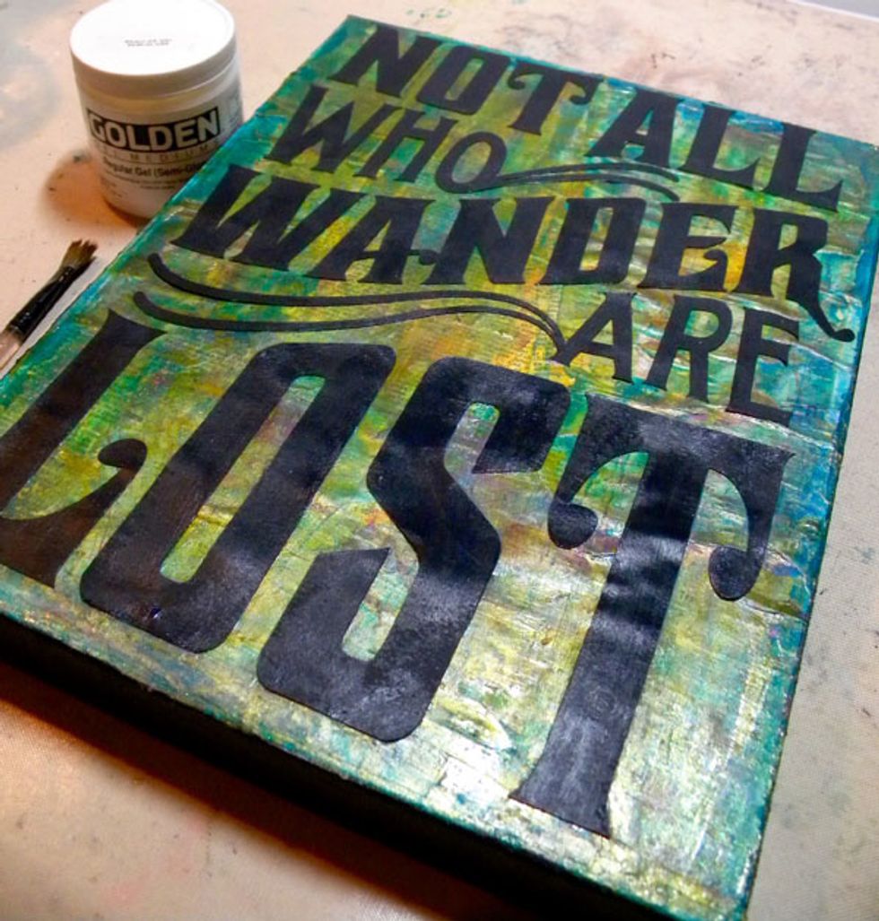 Use semi-gloss or gloss gel medium to glue the quote down. I didn't use matte medium because it would take away from the shimmer that I created in my last few layers.