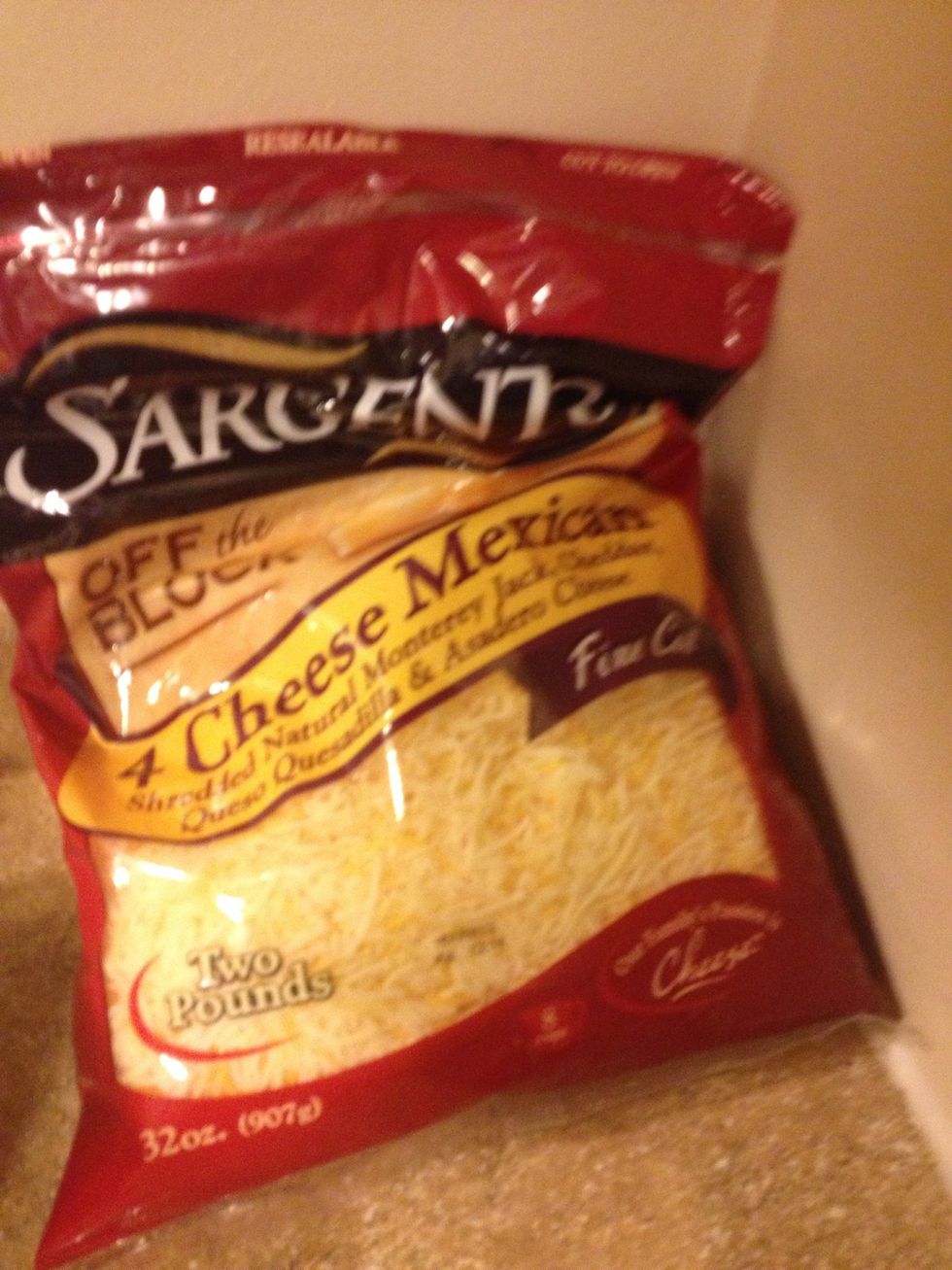 Use shredded mixed cheeses