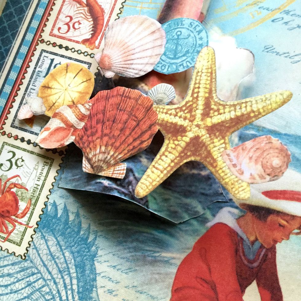 Use some cutout elements to hide the bottom side of the lighthouse.