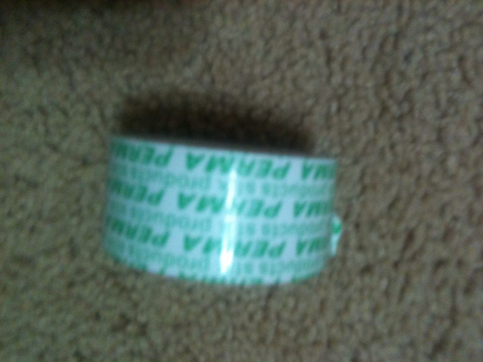 Use some double sided tape to stick the flowers on the canvas ( remember this idea is optional you don't have to stick the flowers on )