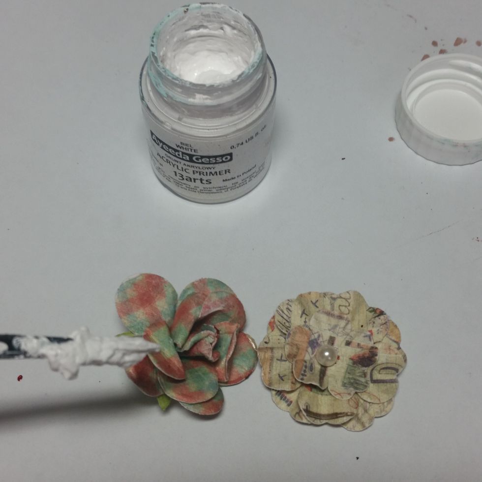 Use some flowers that you don't like (i have had these for ages and the colors are just all wrong for me). Paint with gesso.