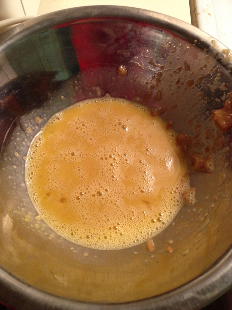 Use some of the mixture in the pot to temper your egg. Add small amounts at a time while constantly stirring. If you're unsure what this means, Google or YouTube it.