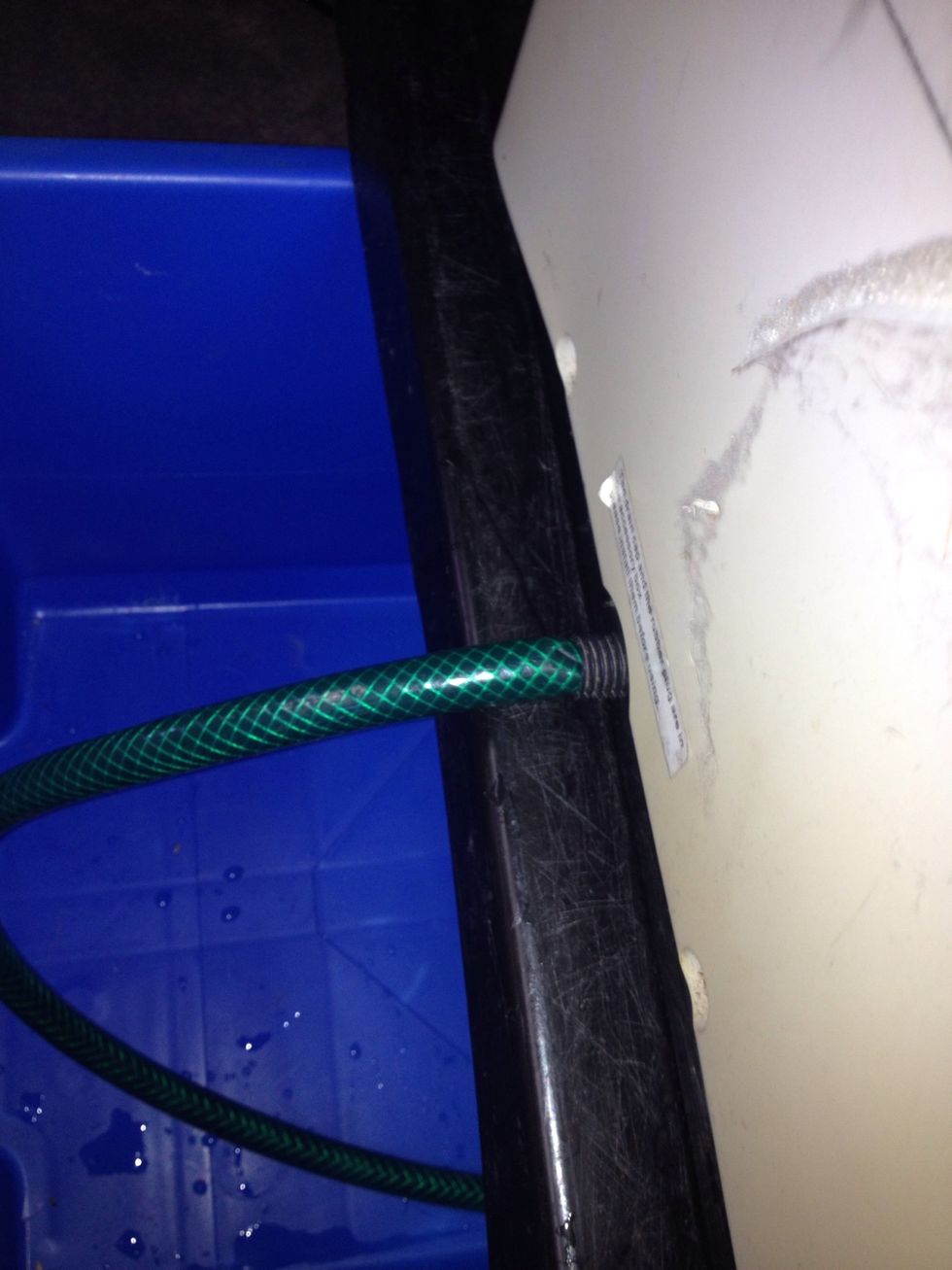 Use some pipe to direct the water