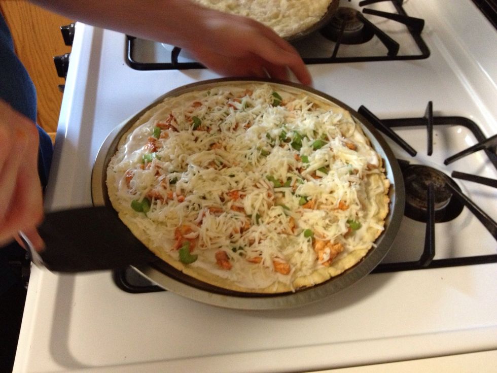 Use spatula to take pizza off the pan to place pizza directly on rack.
