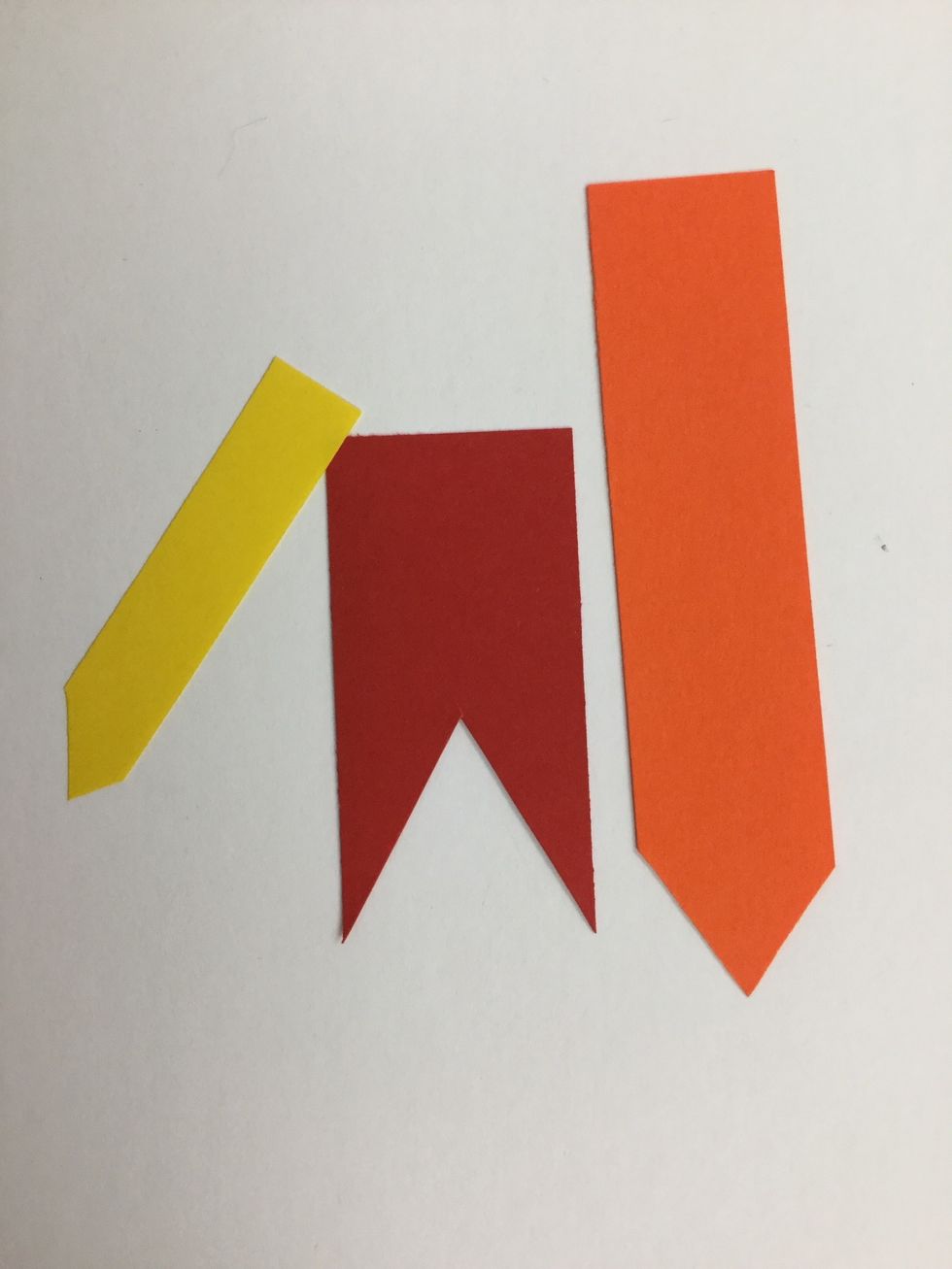 Use straight scissors to cut scrap strips of paper into a tongue shape. These are some ideas for how you can cut the tongue.