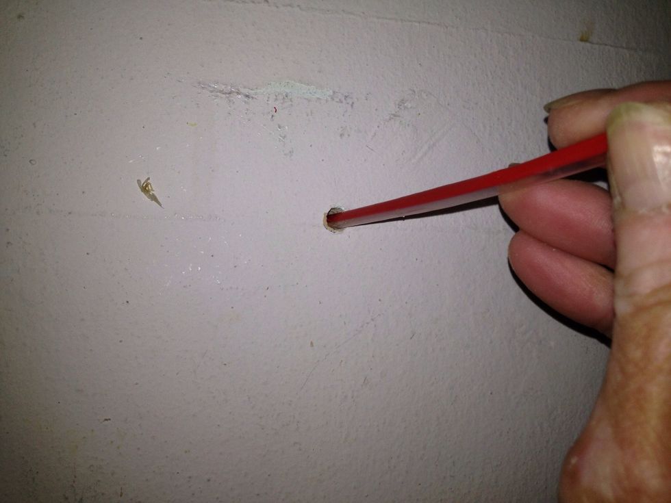 Use straw to blow out brick dust. CLOSE YOUR EYES.