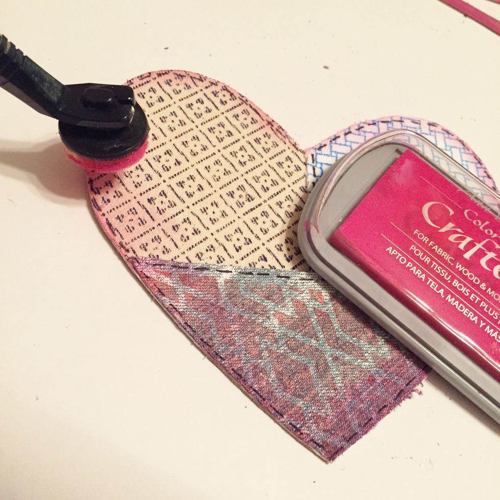 use Stylus & Tip to distress edges of hearts using Berry Ink. heat set.