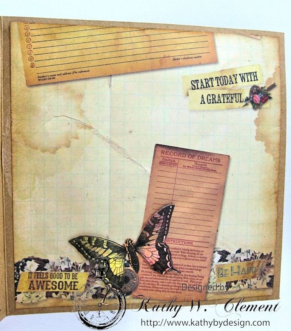 Use the 8x8 Ordre du Jour collage paper on the right hand side of the card interior.  Fussy cut the small butterfly from the Mixed Media Origins paper. Color and add to the collage.