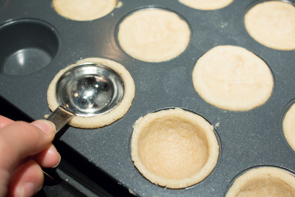 Use the back of a tablespoon and make indentations.