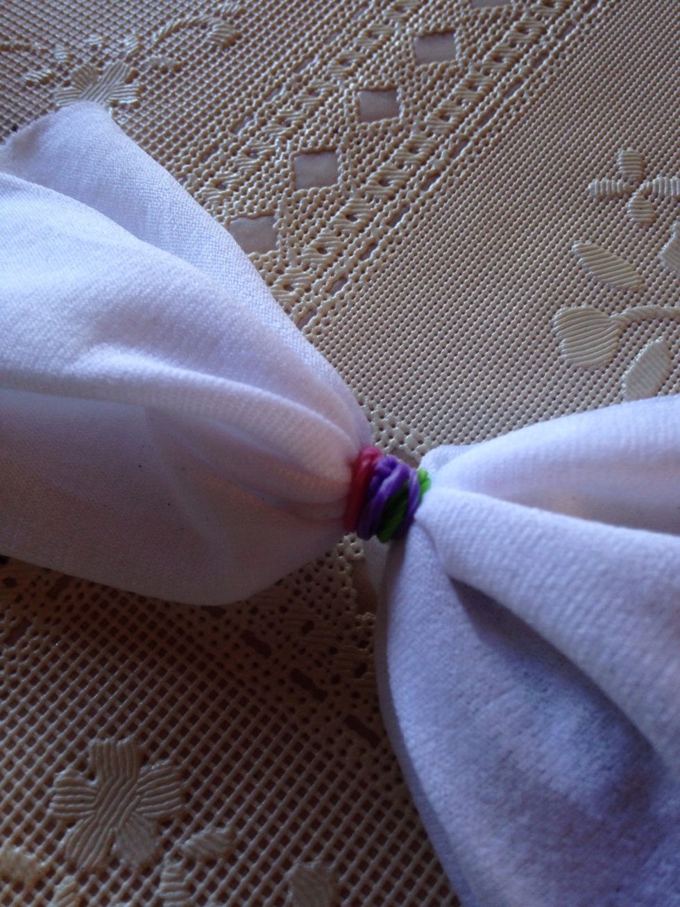 Use the bands to tie off the open end.