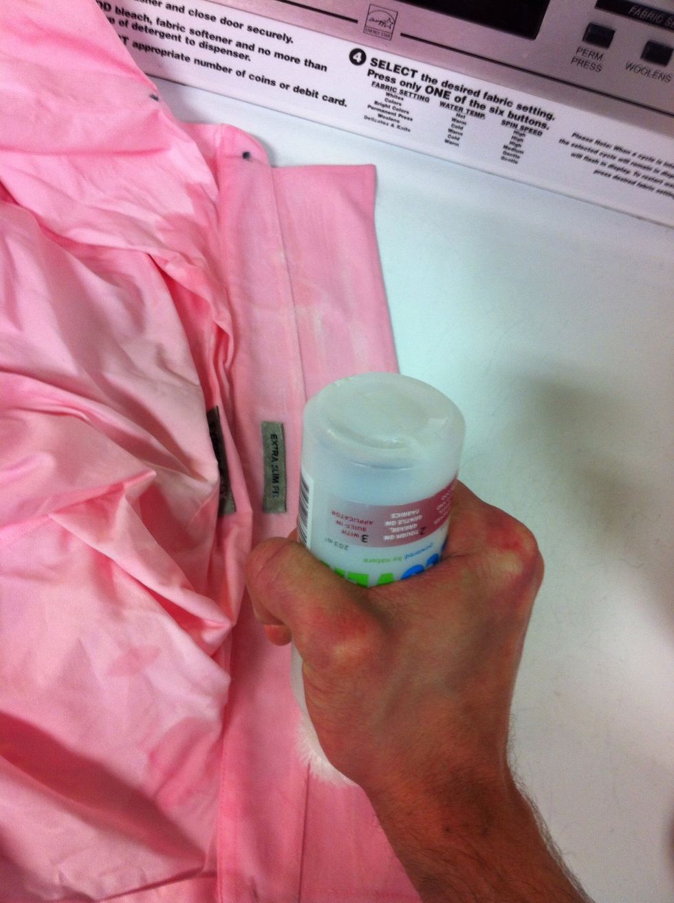 Use the bottles brush to rub the stain with moderate force a couple times..