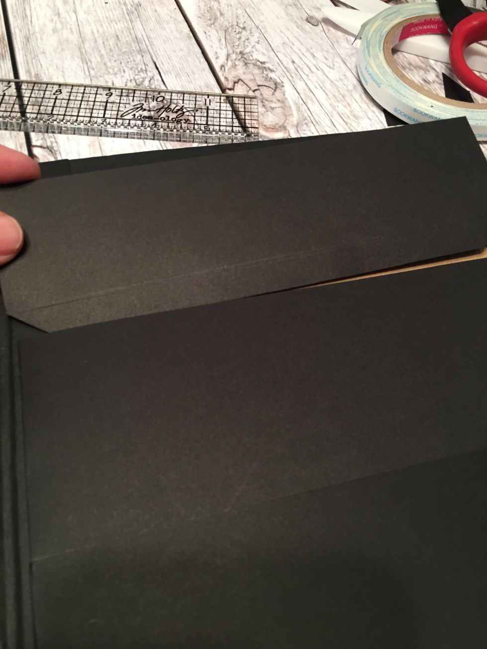 Use the bottom fold line as a placement guide and insert/attach the top pocket into the last pocket. You will pattern the page and pockets later.