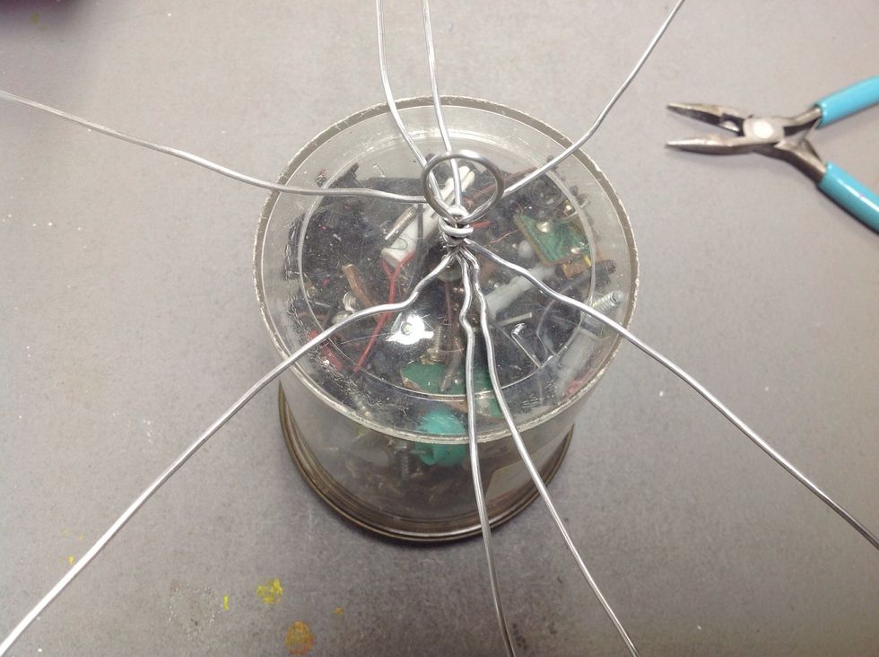 Use the bottom of a cup or cylindrical form to use as a mold for our birdcage shape.