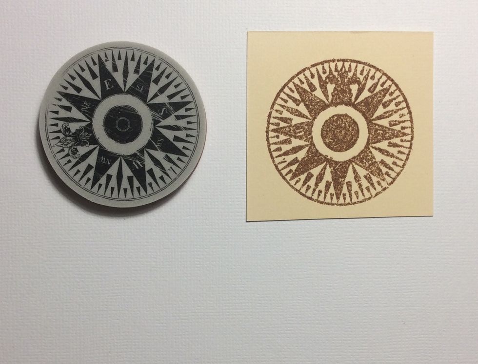 Use the by the sea compass stamp and form image using embossing ink and the heat set vintage photo distress powder.